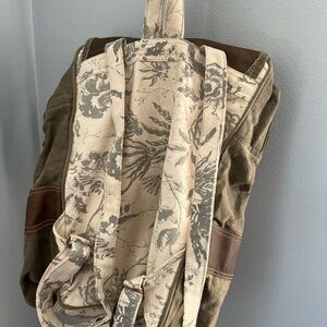 CLEA RAY BACK PACK CANVAS AND‎ LEATHER FLORAL BEIGE AND GREEN COLOR